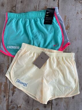 NWT - two pairs of Nike lacrosse shorts size large